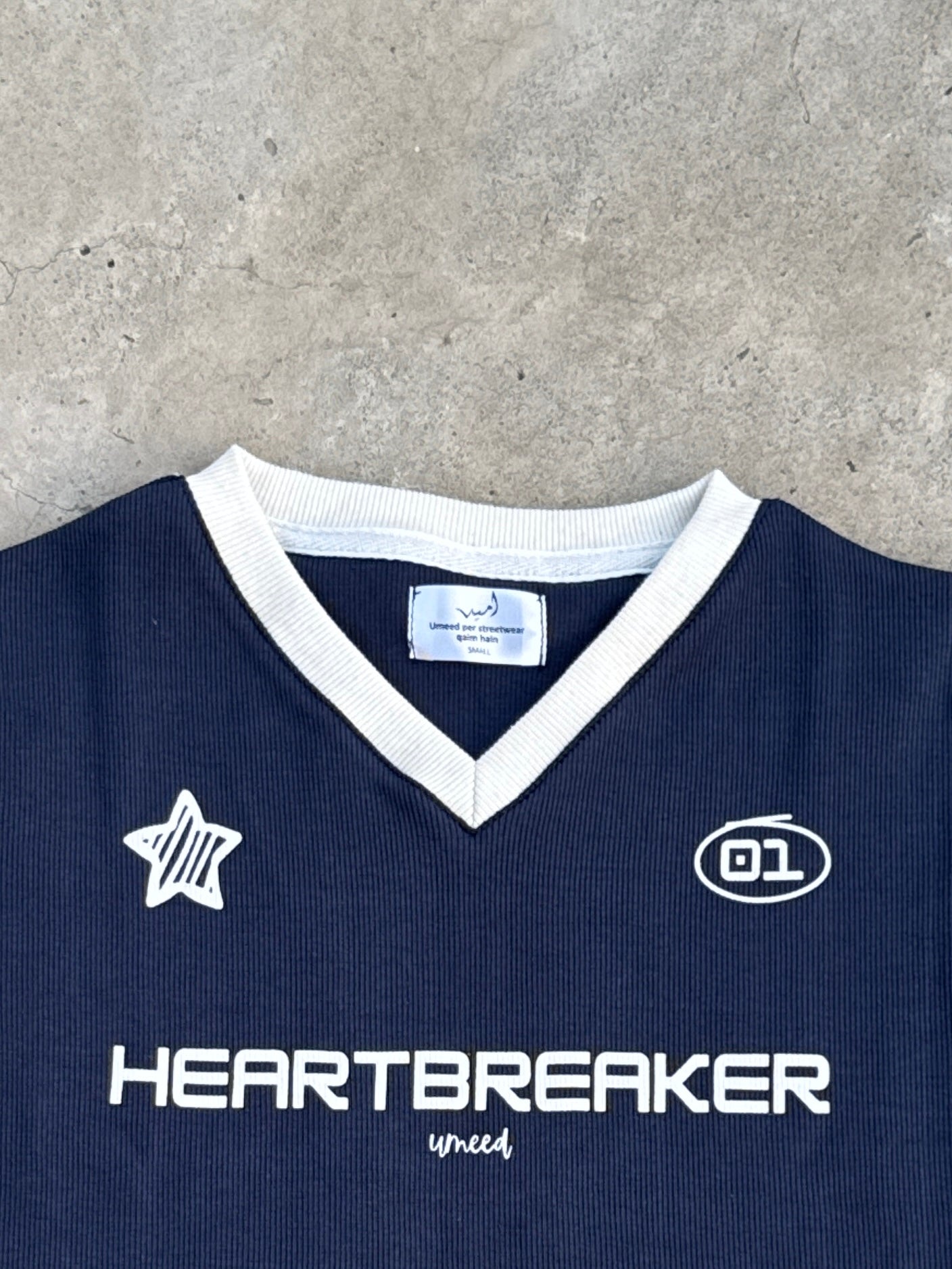 Ribbed “Heartbreaker” baby tee