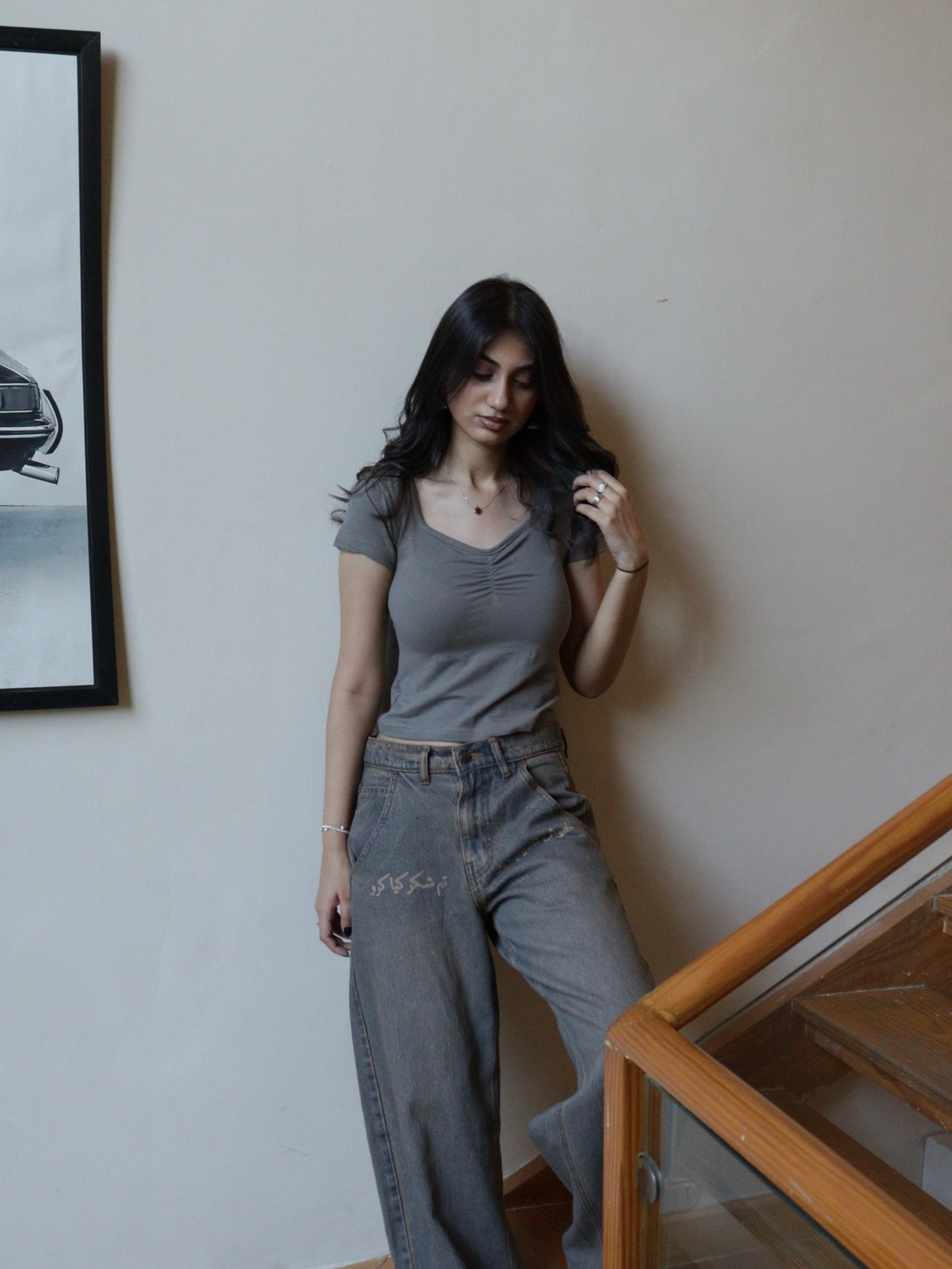 clinched grey baby tee