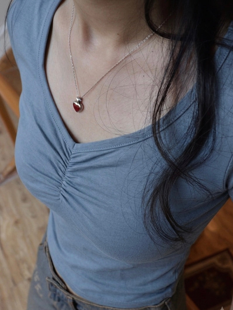 clinched blue baby tee