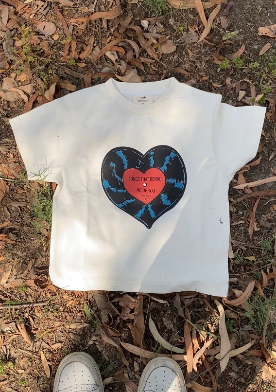 “Songs that remind” baby tee