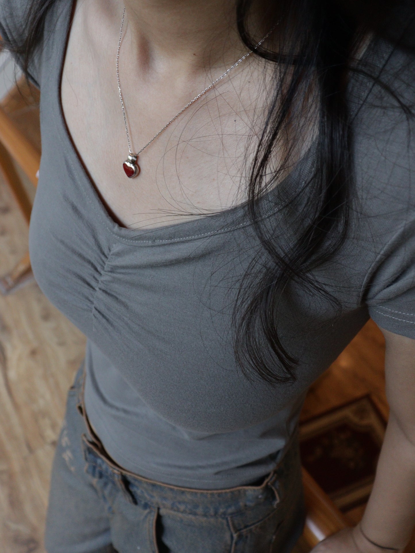 clinched grey baby tee